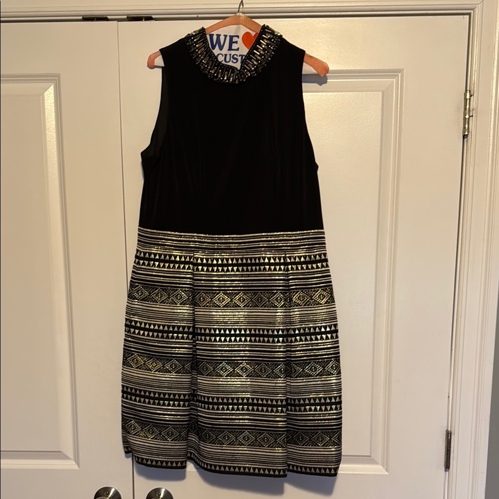 Sleeveless Black Dress with Gold Patterned Skirt